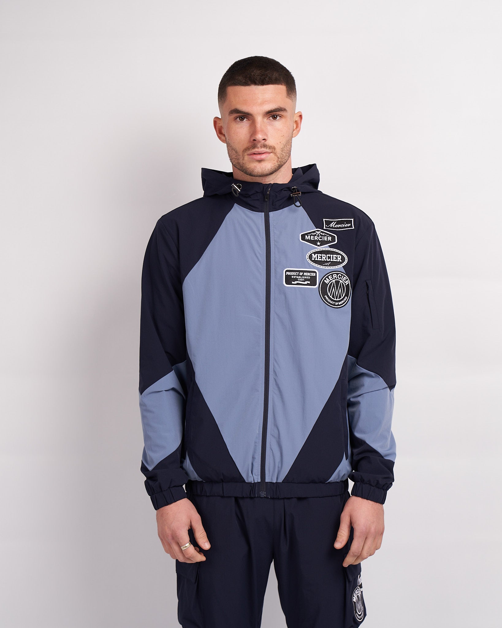 Navy Placid Blue Mono Badge Panelled Windbreaker – MERCIER