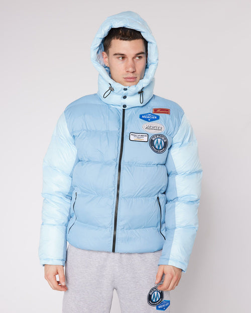 Blouson bleu ciel AND Badge